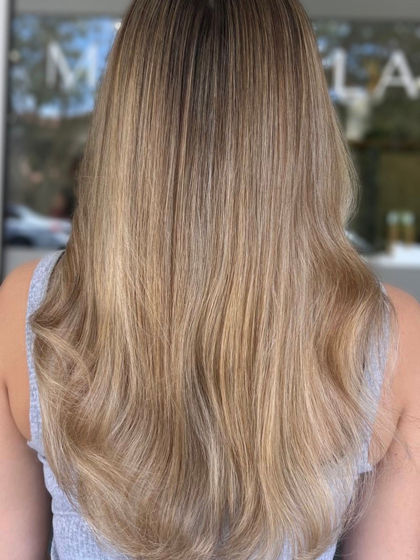 @georgia.mandalahair  blended balayage is here to steal the spotlight! 🌟

With soft blended roots and perfect flicked ends!! 

#BlendedBalayage #HairGoals #MandalaBabe