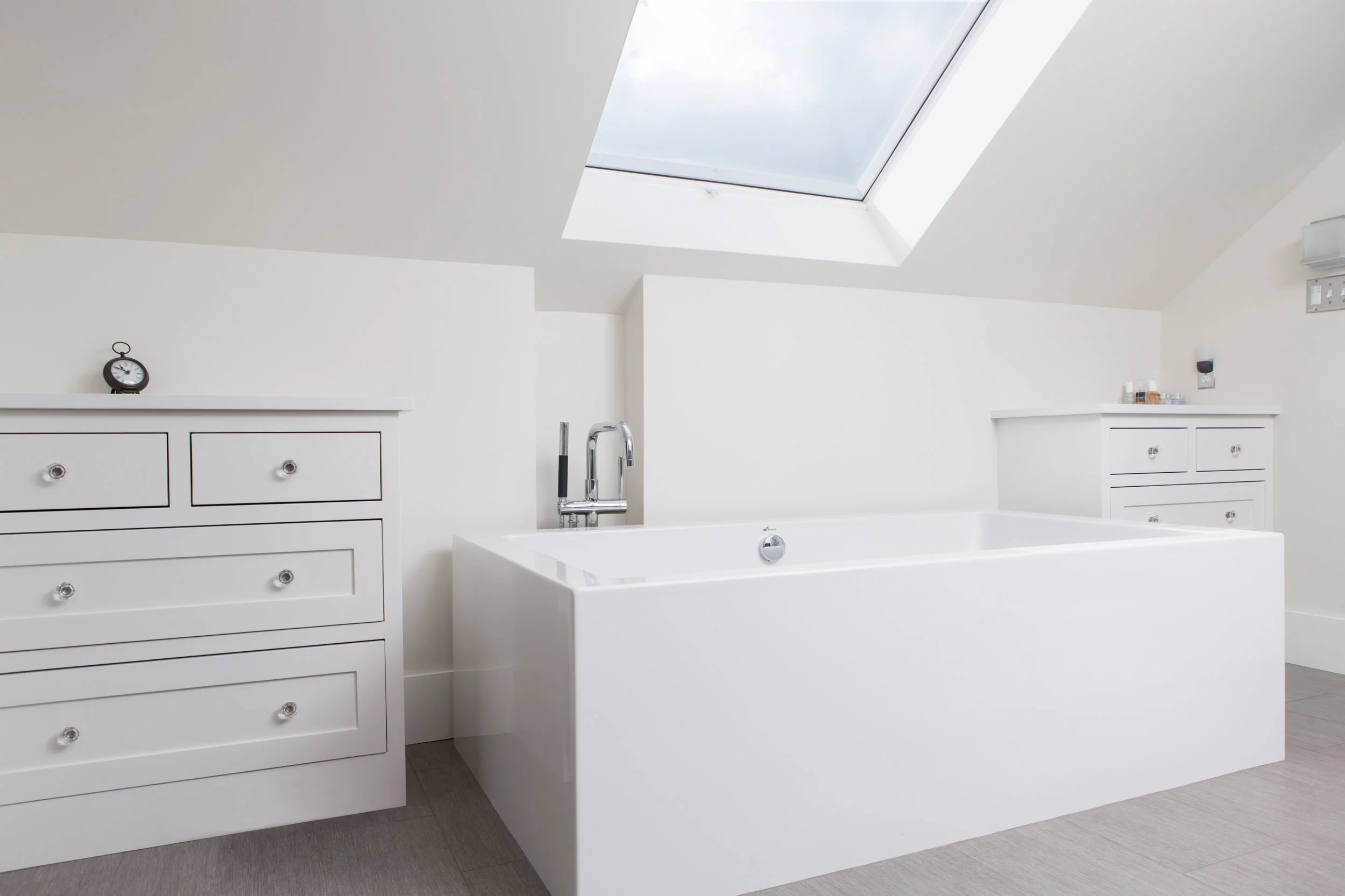 Light and Bright Attic Bath Retreat
