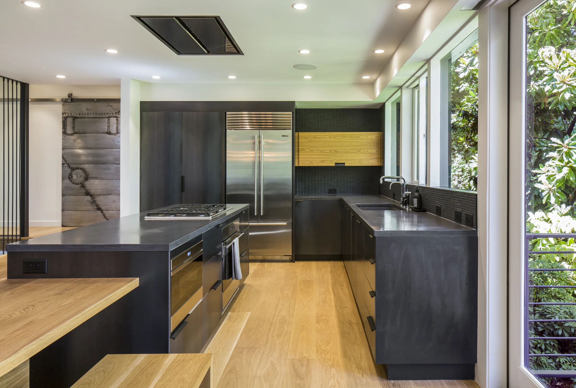 Modern Details in Kitchen Including Flush Range Hood
