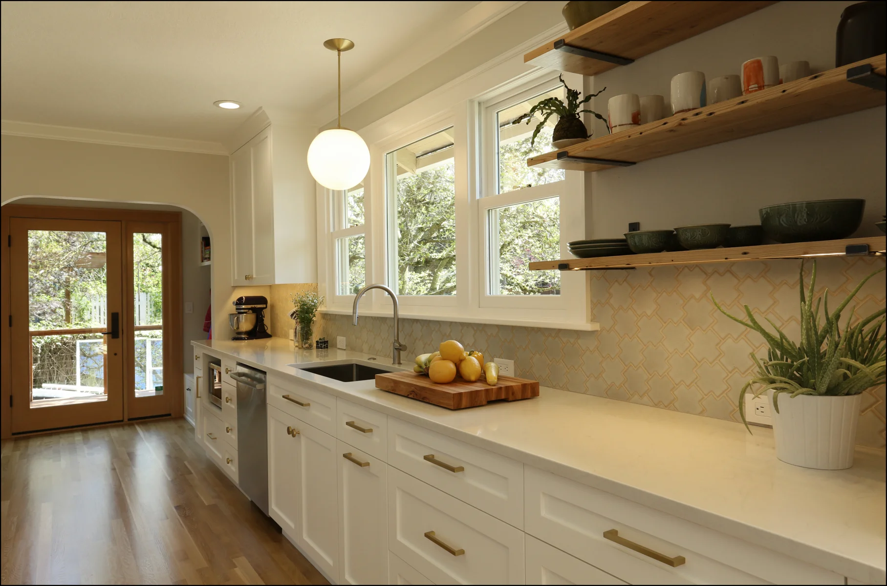 Large Window at Sink & Open Shelving