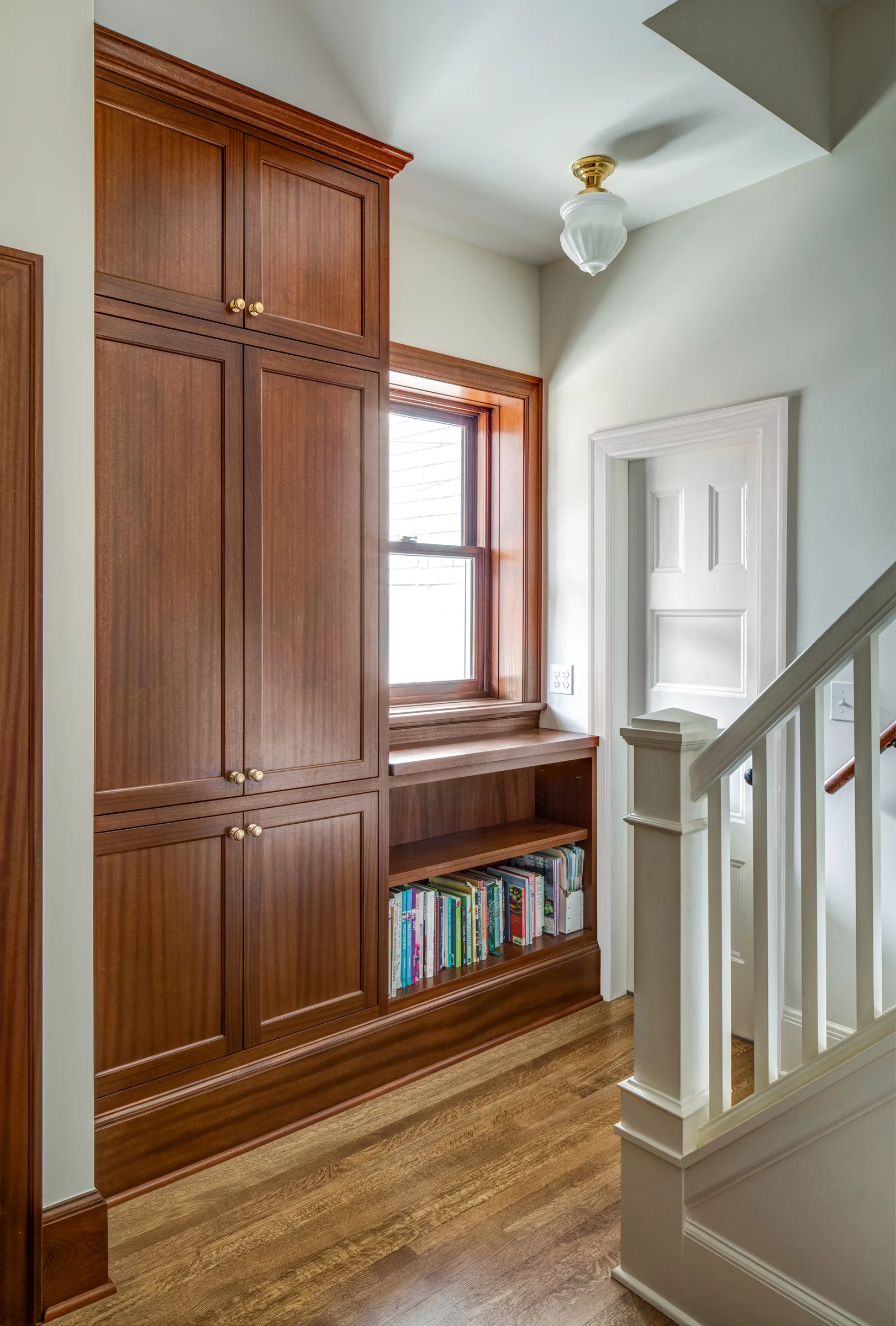 Convenient Pantry and Storage Cabinet at Back Stair
