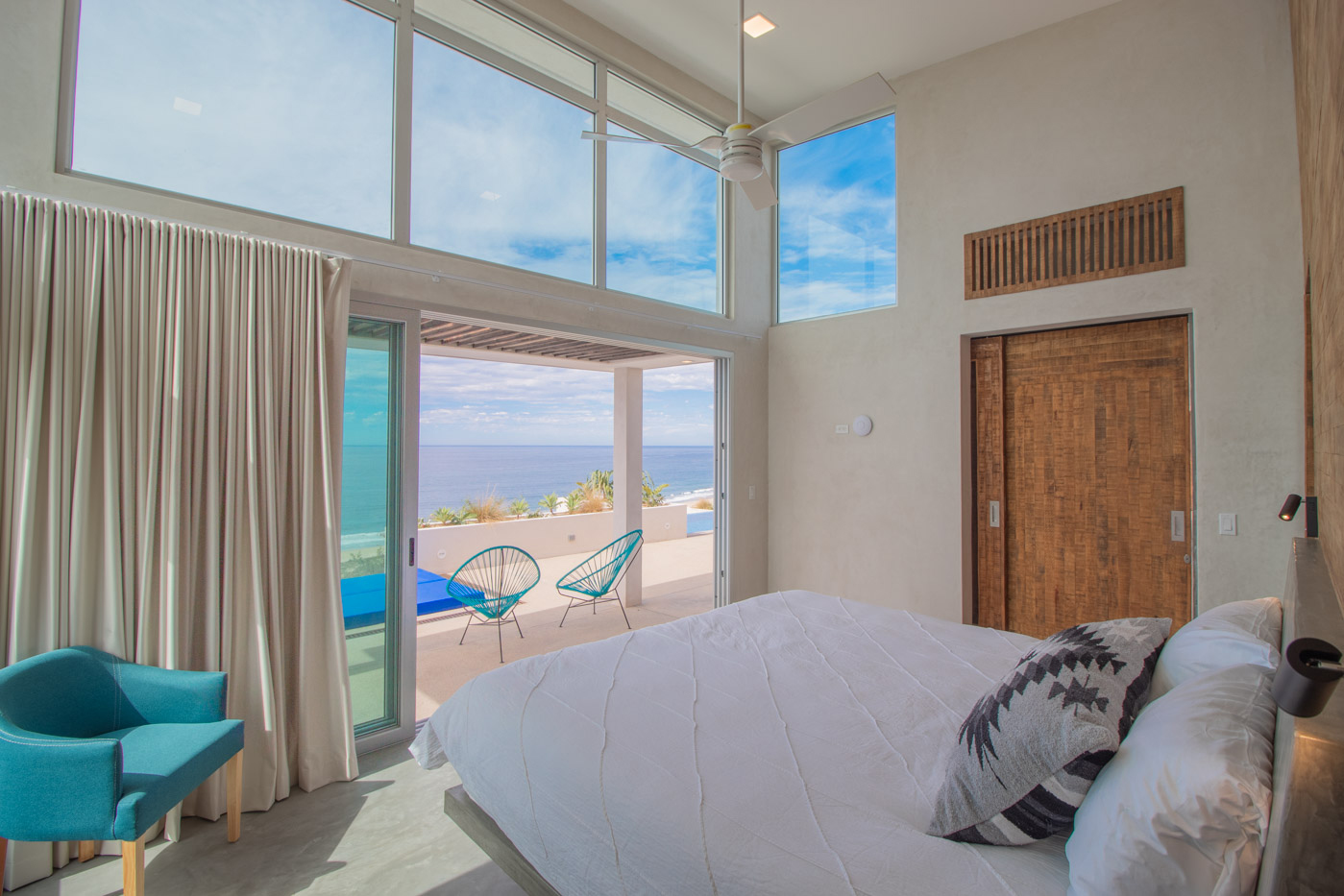 Light filled master bedroom with a view