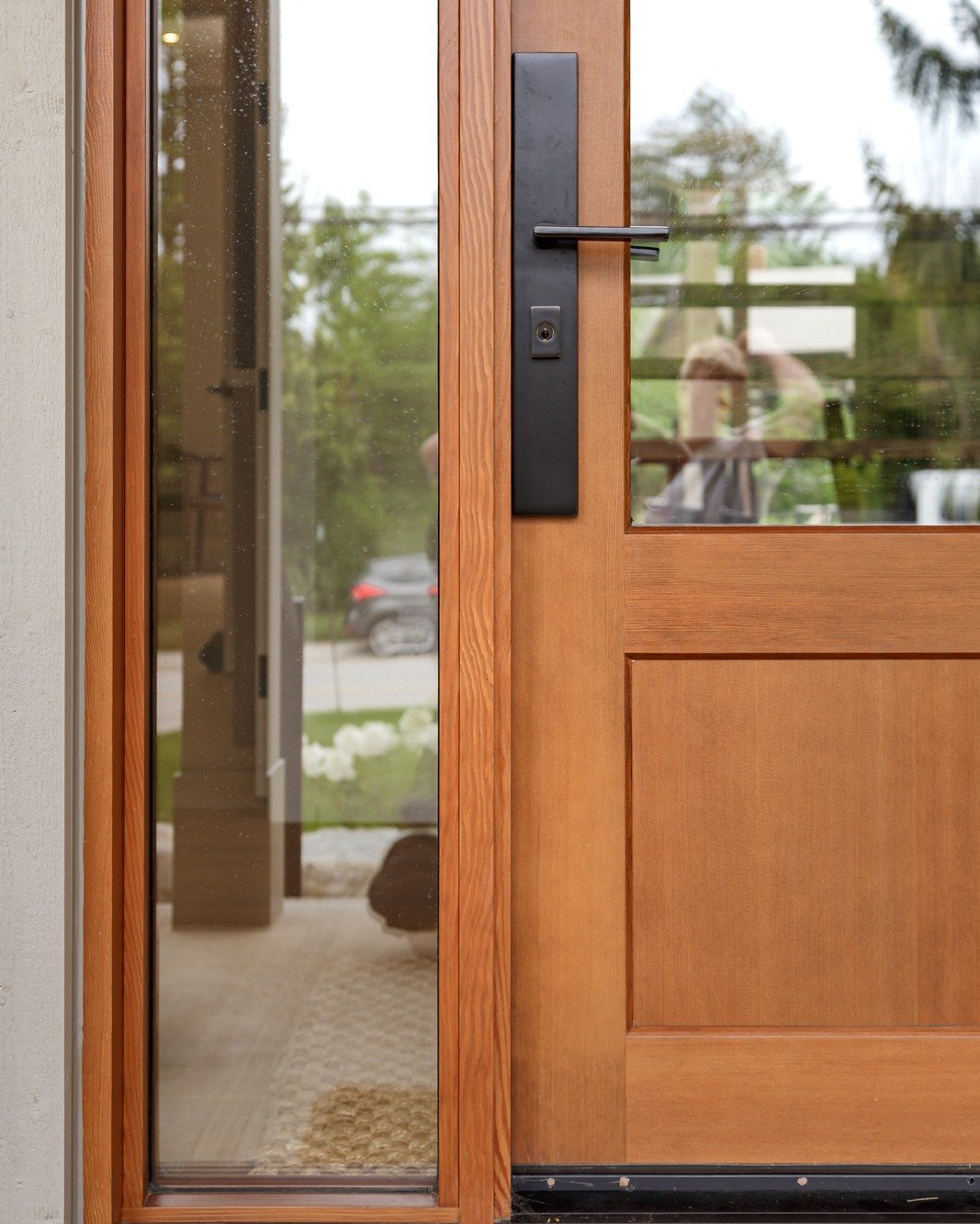 The combination of the beige wood siding and stained front door are a welcoming site approaching this home. The stained accent soffit also adds warmth when sitting on the front porch having your first sip of coffee. ☕
.
.
.
.
.
 #homedesign #customde