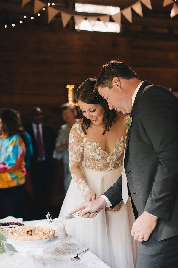 Nicole + Brian Cake Cutting.jpg
