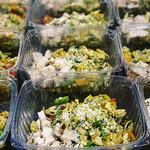 Farmers market pasta salad. Lots of fresh vegetables with gluten free chickpea pasta tossed in basil pesto and herb-roasted chicken.