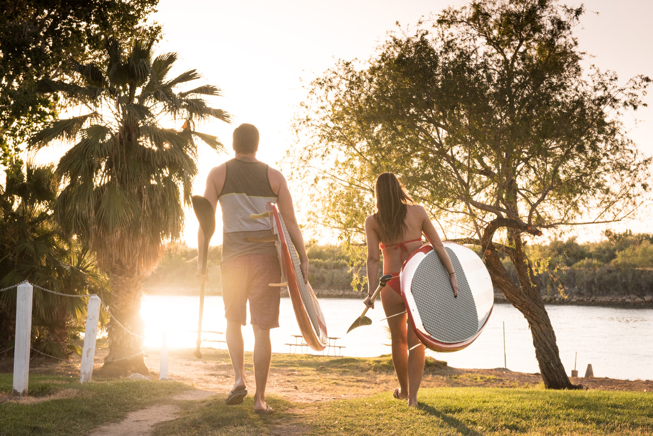 Couple with paddle boards at Arizona Oasis.jpg