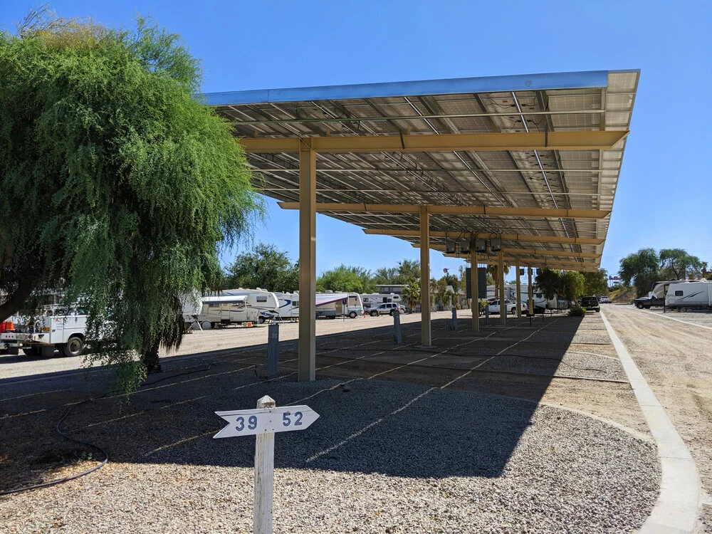 solar-covered-rv-site-with-tree.jpg