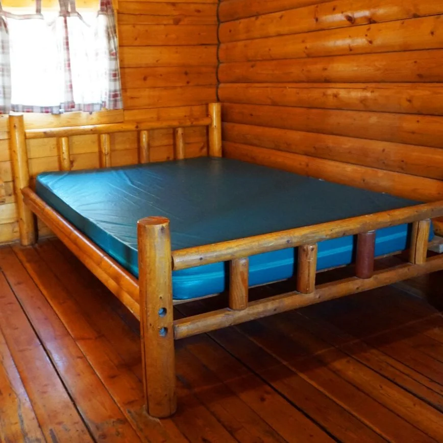 cabin-interior-bed-windows.jpg