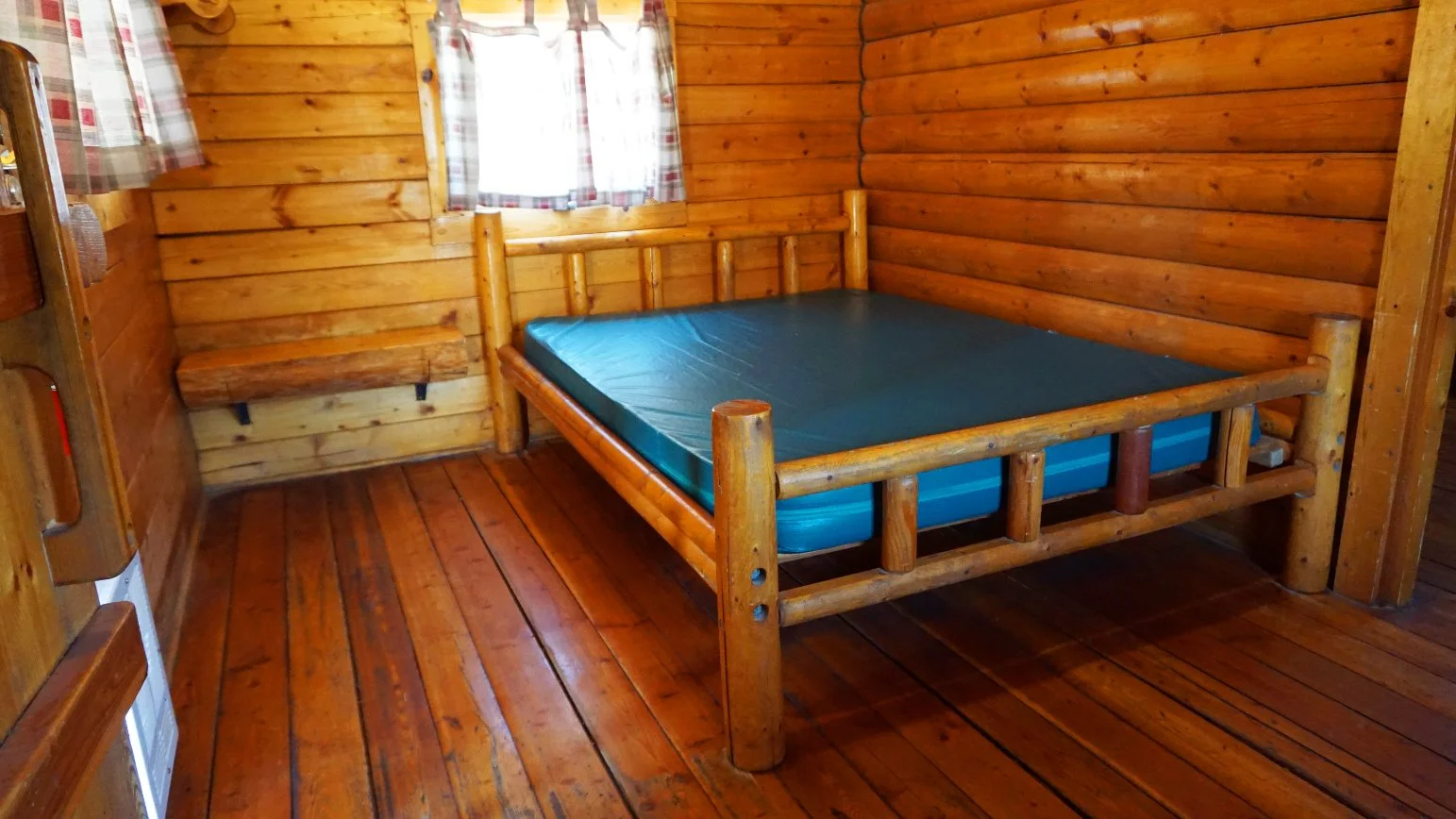 cabin-interior-bed-windows.jpg