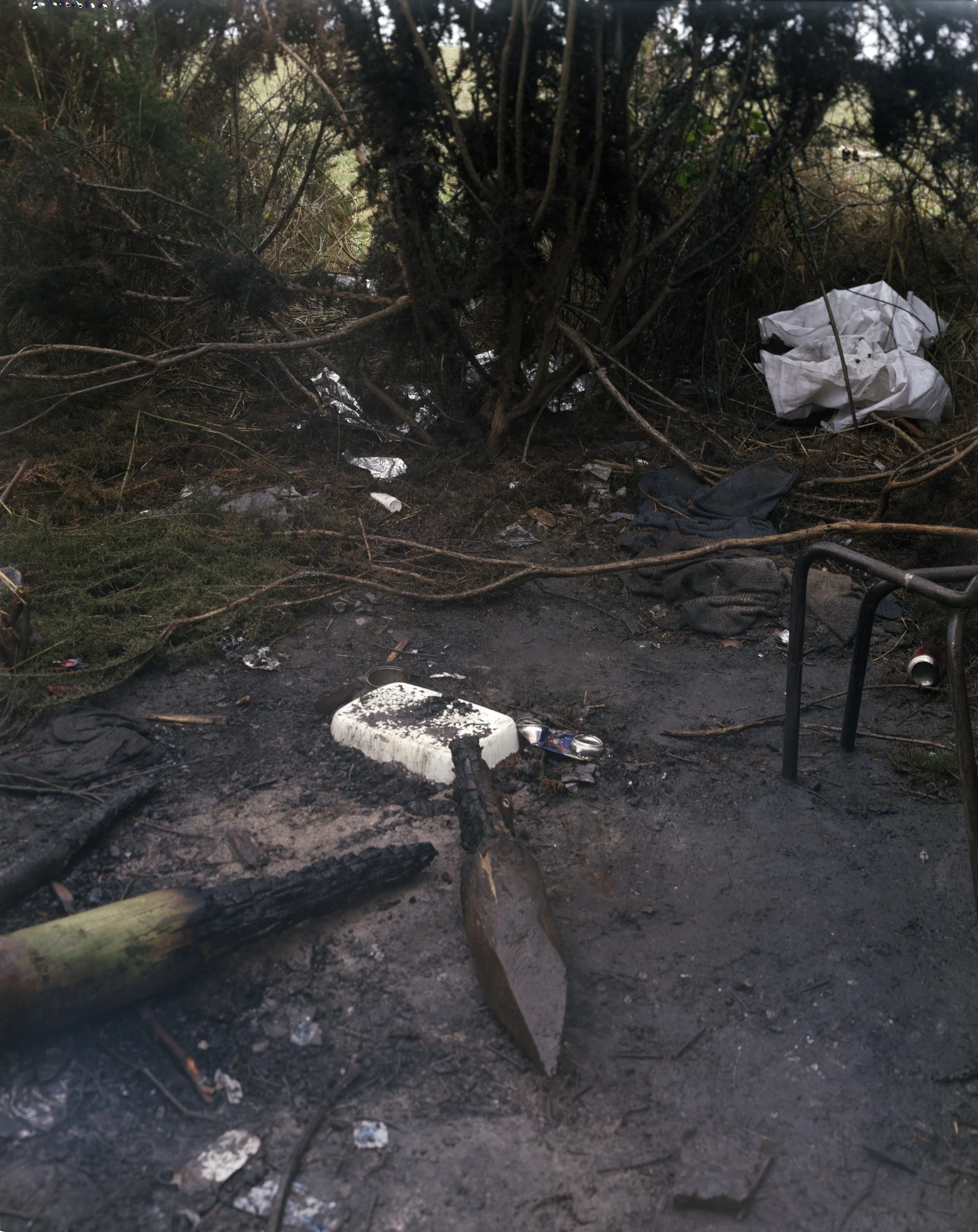 Campsite burnt by the police