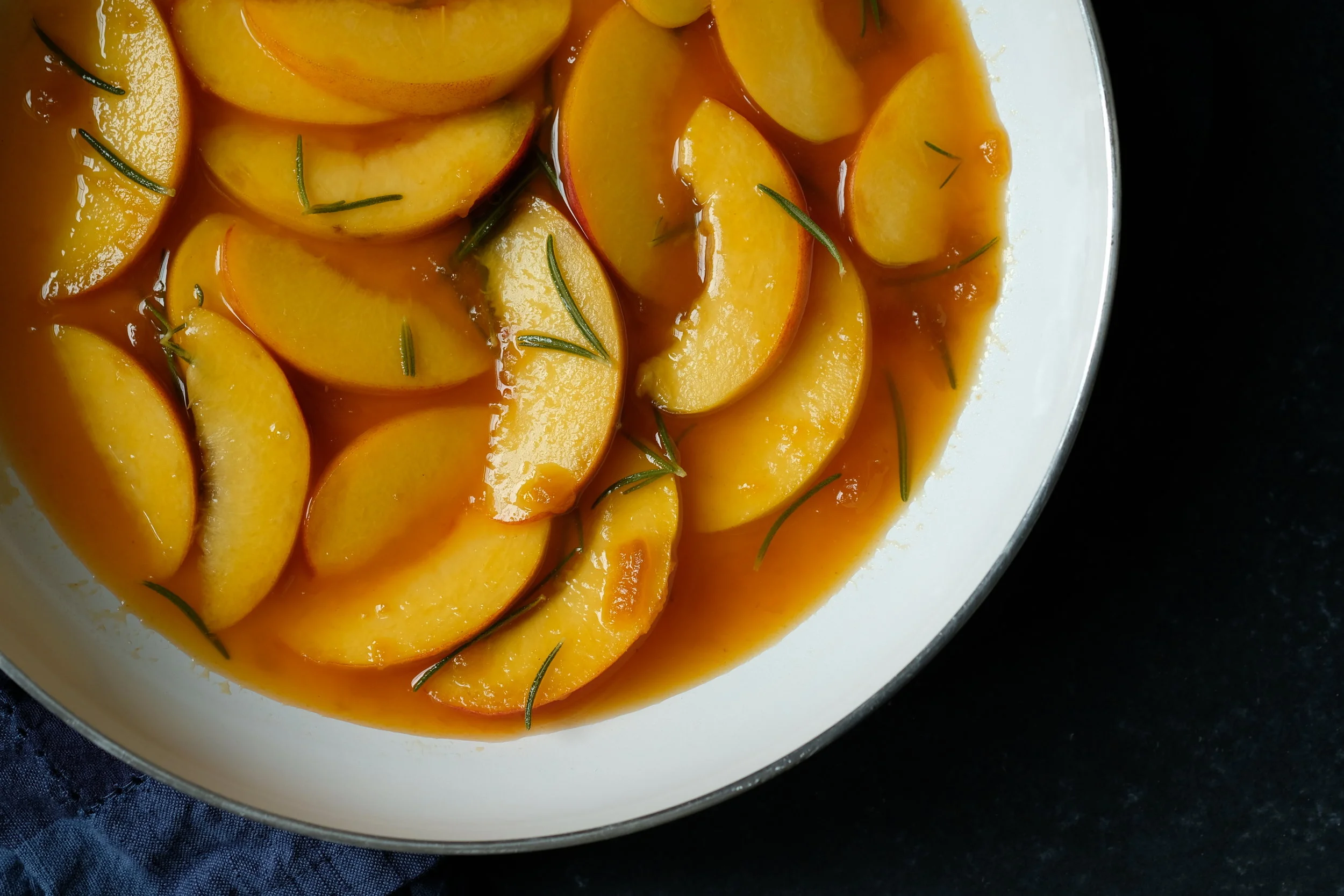 Glazed fresh peaches with rosemary by Diana Muresan food photographer