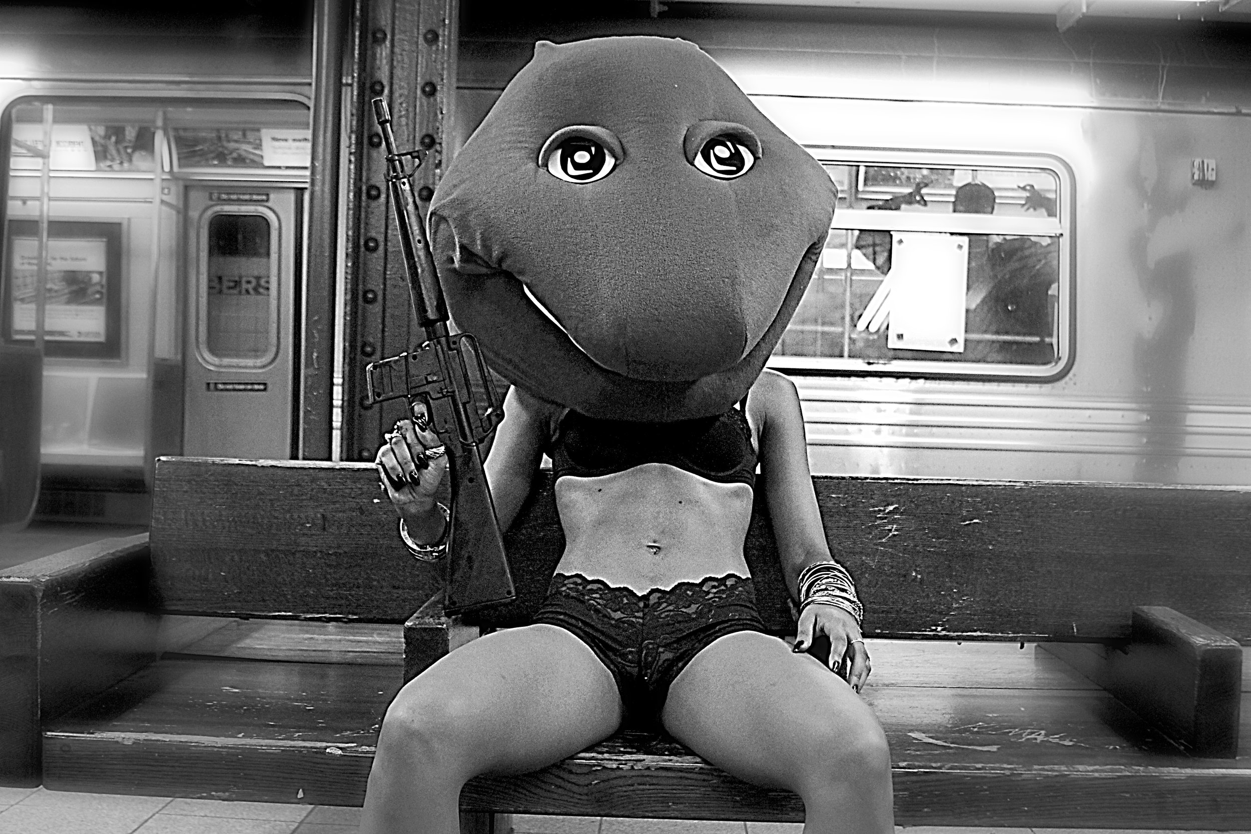 Woman Barney Mascot head on subway