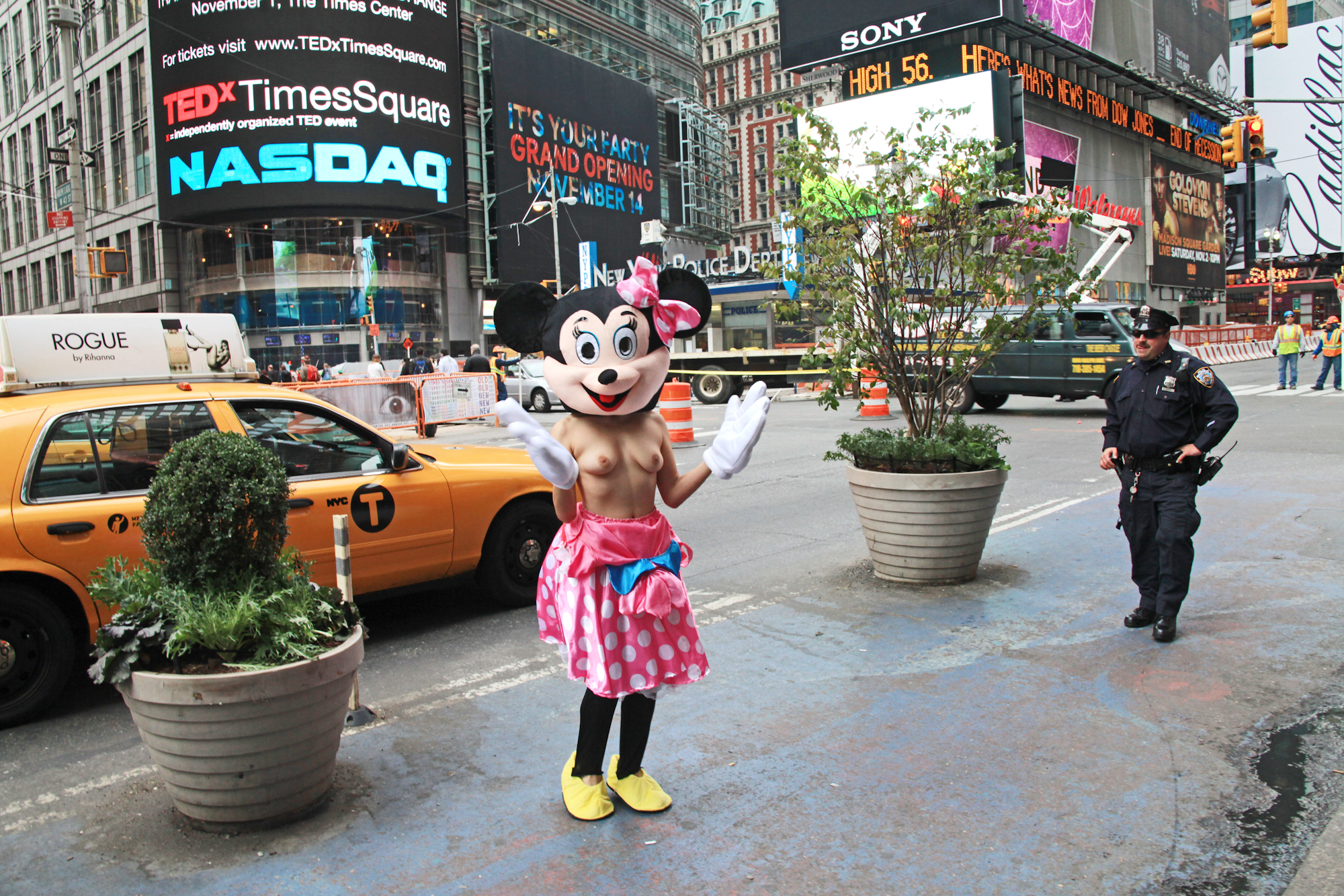 Topless Minnie Mouse in Times Square by Mel D. Cole