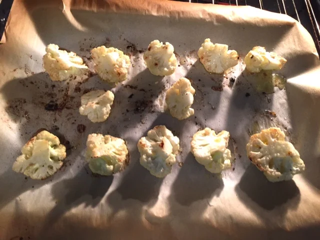 Lemon Garlic Roasted Cauliflower Recipe, roasting on cookie sheet.