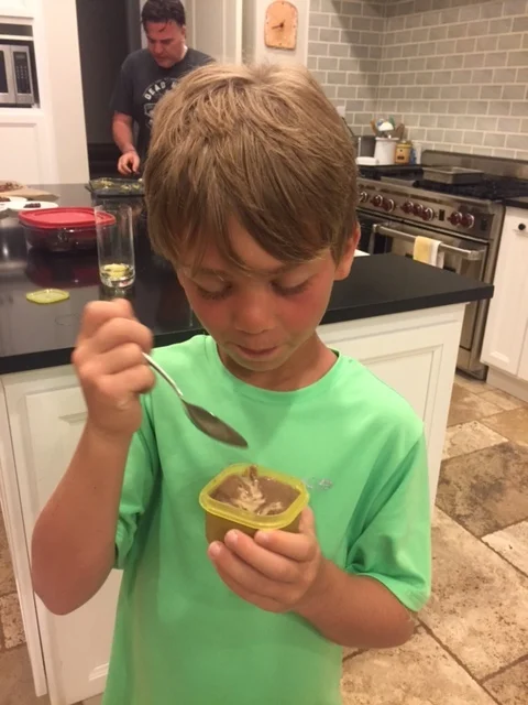 Kid eating Banana Pudding