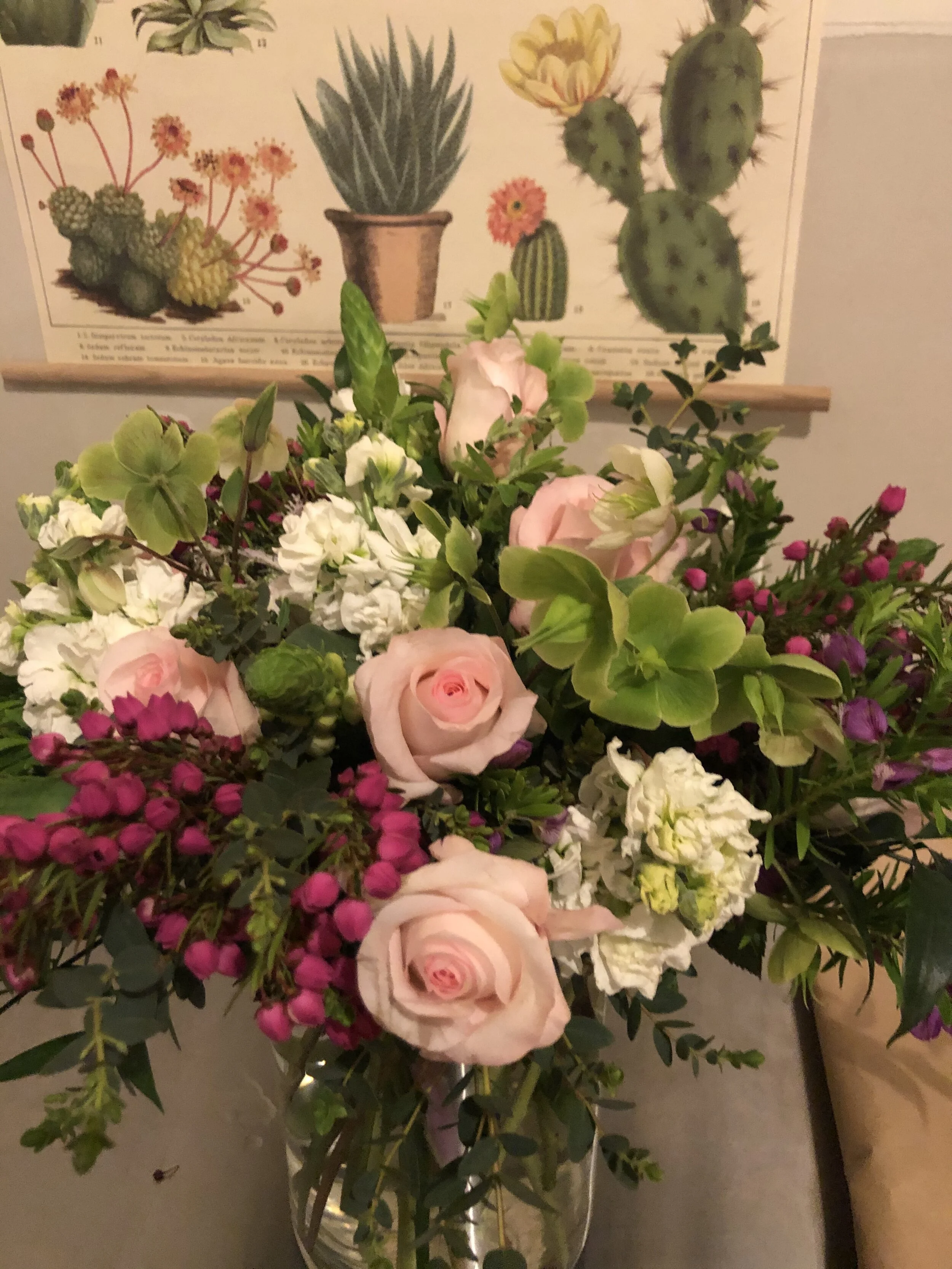 Springtime fresh floral arrangement with boronia and white stock by Snowdrops & Sage