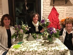 Group flower arranging in a workshop at Snowdrops & Sage in Arvada, CO