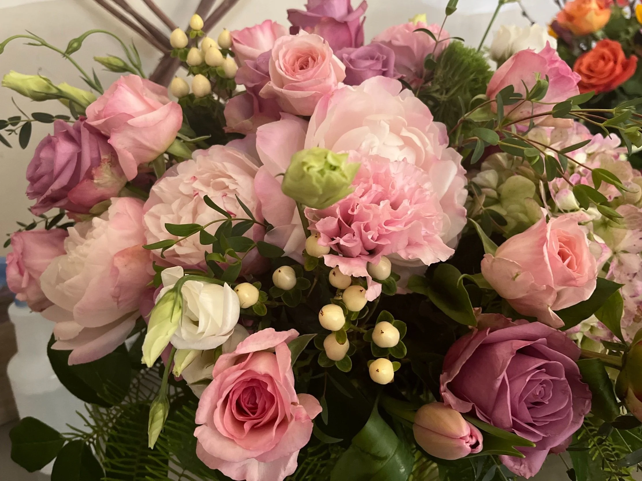 Floral arrangement featuring various shades of pink and white flowers by Snowdrops & Sage in Arvada, CO