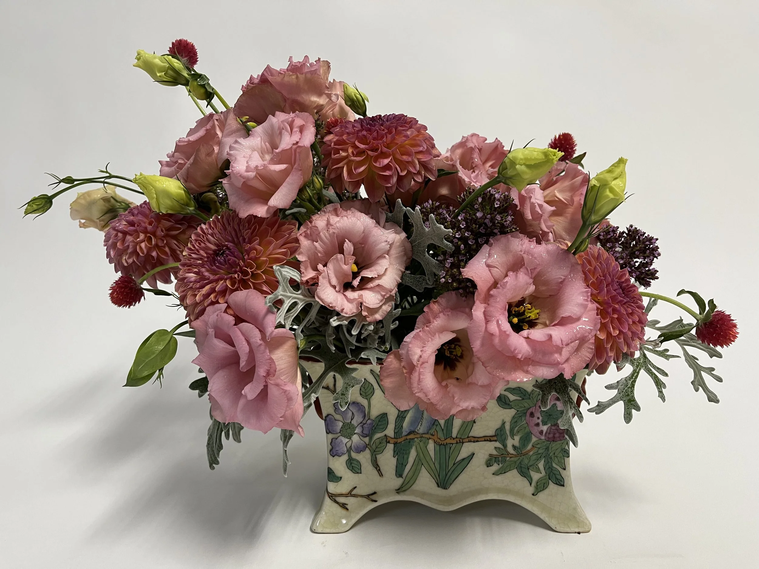 Pink and orange flower arrangement featuring dahlias and zinnias by Snowdrops & Sage in Arvada, CO