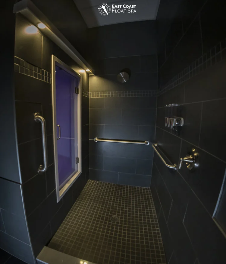 “Most of the people who know about Floating already are usually only familiar with the old-fashioned, enclosed structures referred to as isolation tanks or sensory deprivation chambers. East Coast Float Spa's customized, modern, and spacious Floatation Therapy Rooms bring the future of high-end Floatation Therapy to everyone! Large enough to walk into, stand inside, and spread out, our custom-built Float Rooms do not require closing a lid over-top of you and have automated ventilation systems to remove any concerns of shortness of breath or feeling claustrophobic! All Rooms are housed within their own private, individual Suites with your own shower and changing area. Each Room provides the same amazing Float experience: they all have a different aesthetic design but are functionally the same . There's also never any rush to head back out after Floating! Keep relaxing in our Post Float Lounge with Zero-Gravity Massage Chairs and Oxygen Bar, or simply hang out in the calming ambiance and let us know about your Float in our Community Float Journal!”