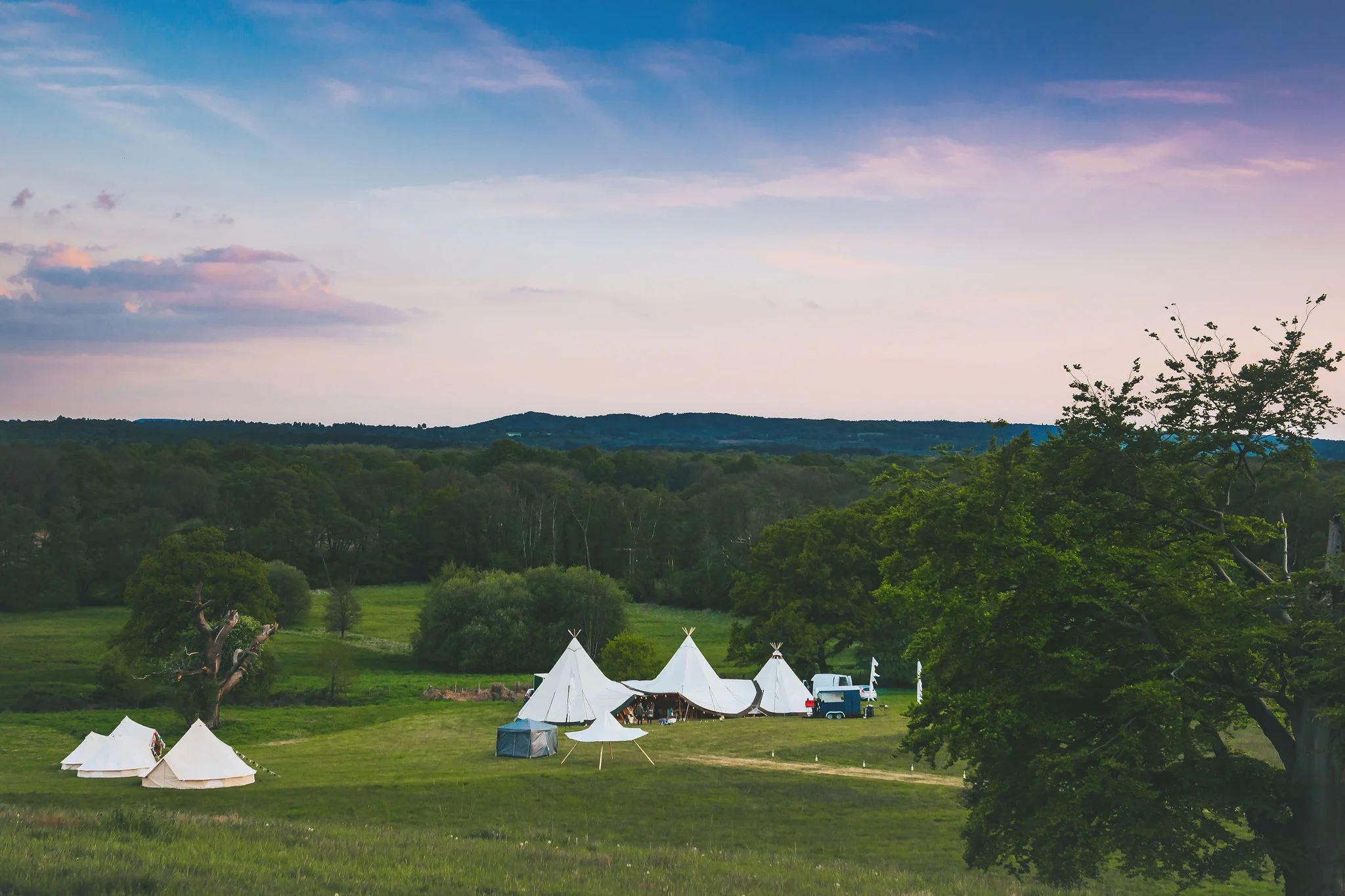canvas-and-light-white-tipi-hire-festival-wedding.jpg