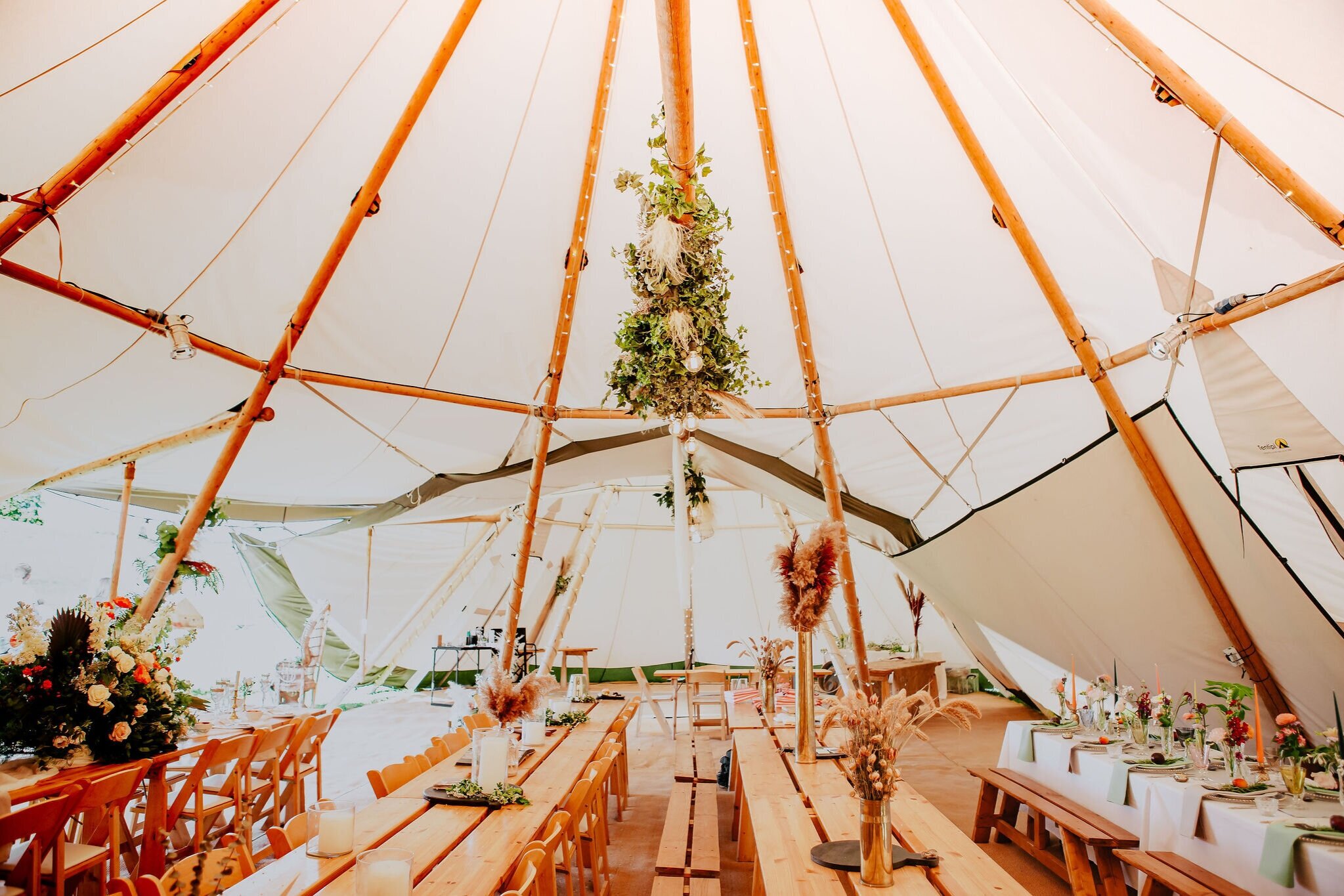 canvas-and-light-white-tipi-hire-banquet-style.jpg