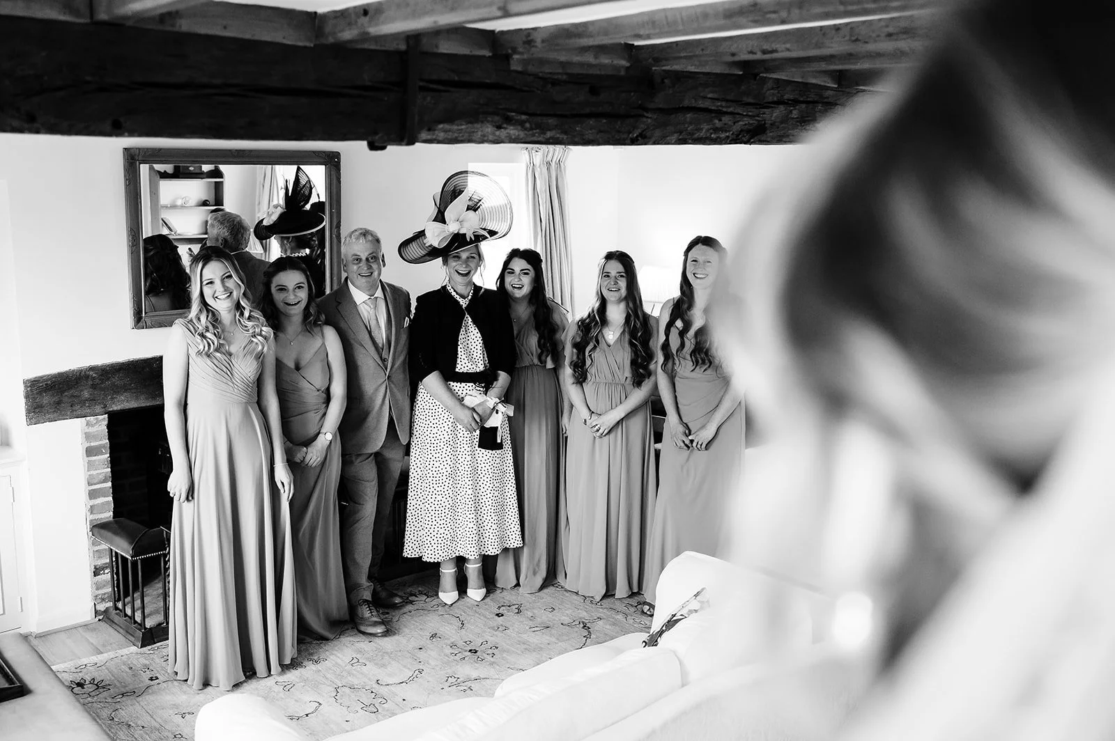bridemaids and parents reacting to the bride
