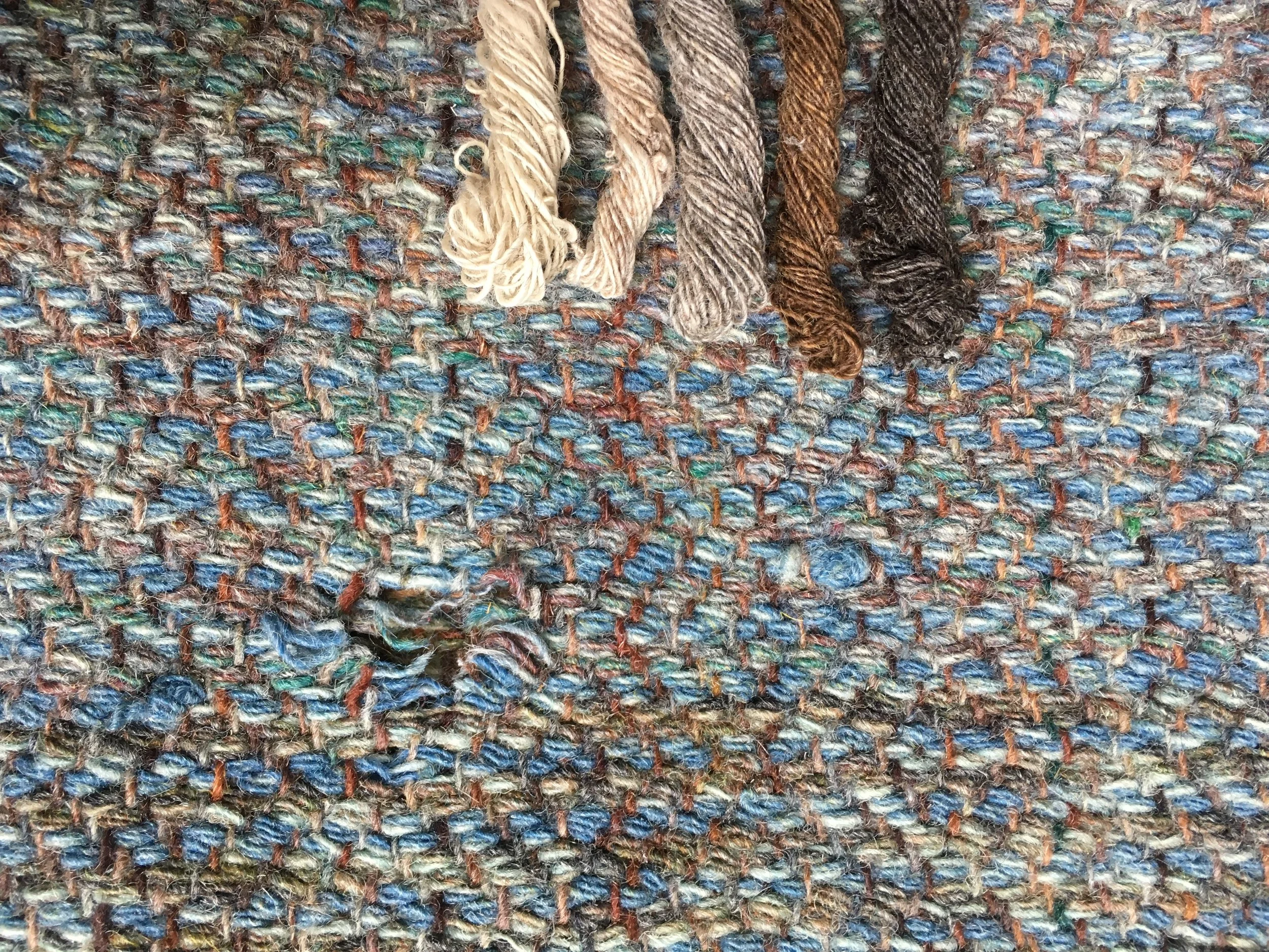  finished yarn, next to hole 