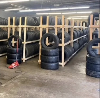 rows and rows of used tires at bobby's towing & auto repair