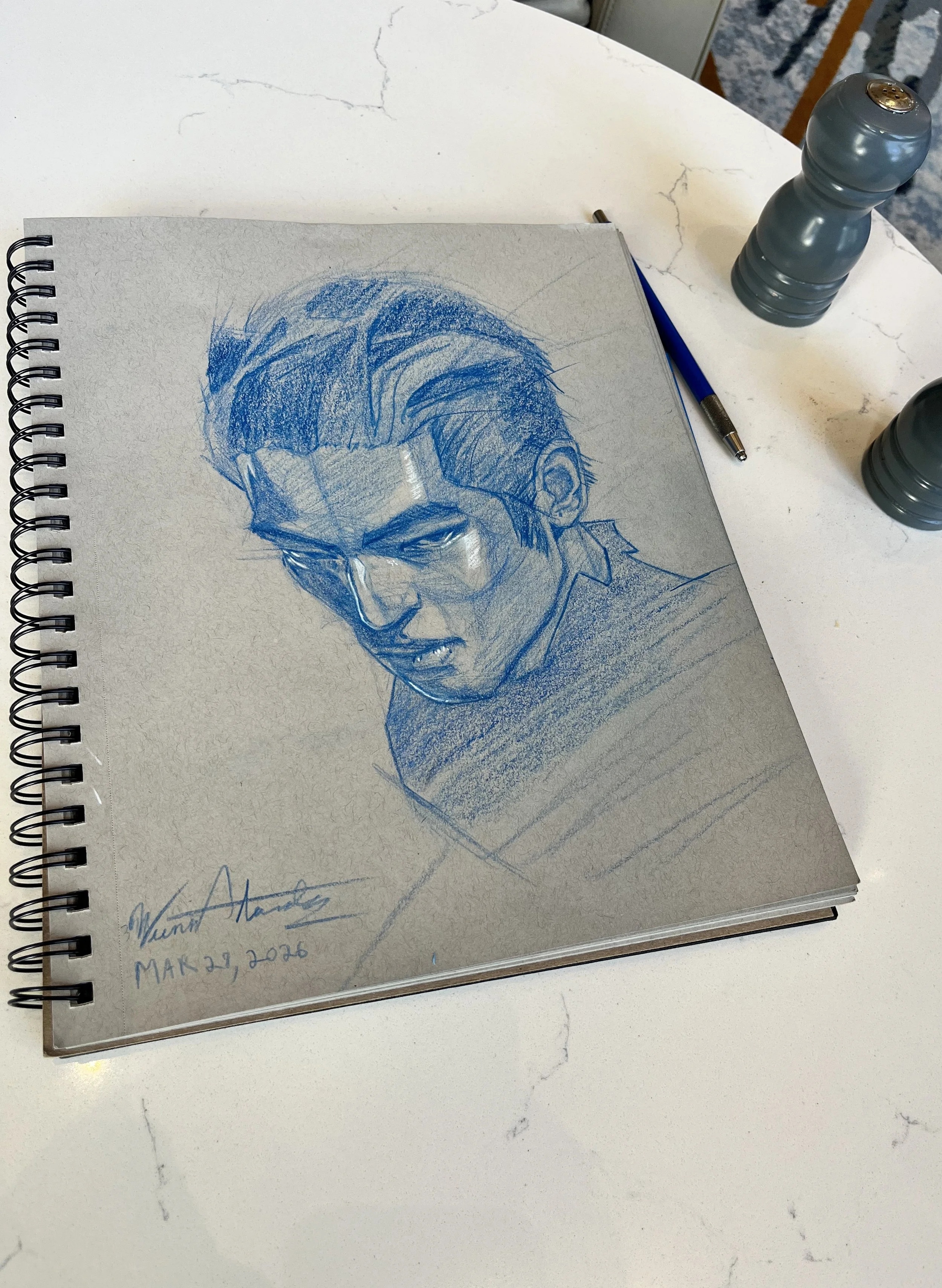 A sketch of a man's face with long hair, rendered in blue pencil on gray paper, signed by Hunt Hardy and dated March 27, 2020.