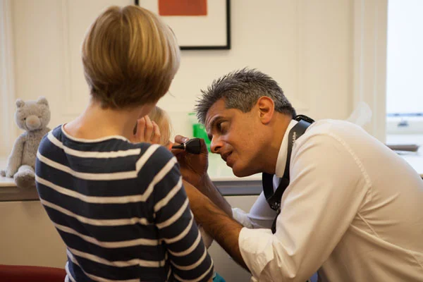 examining ear .jpg