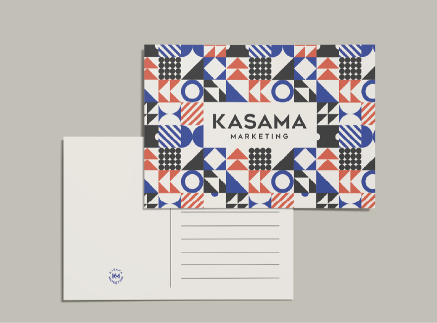Colorful geometric patterned postcard with 'KASAMA MARKETING' in the center and blank lines on the reverse side for an address.