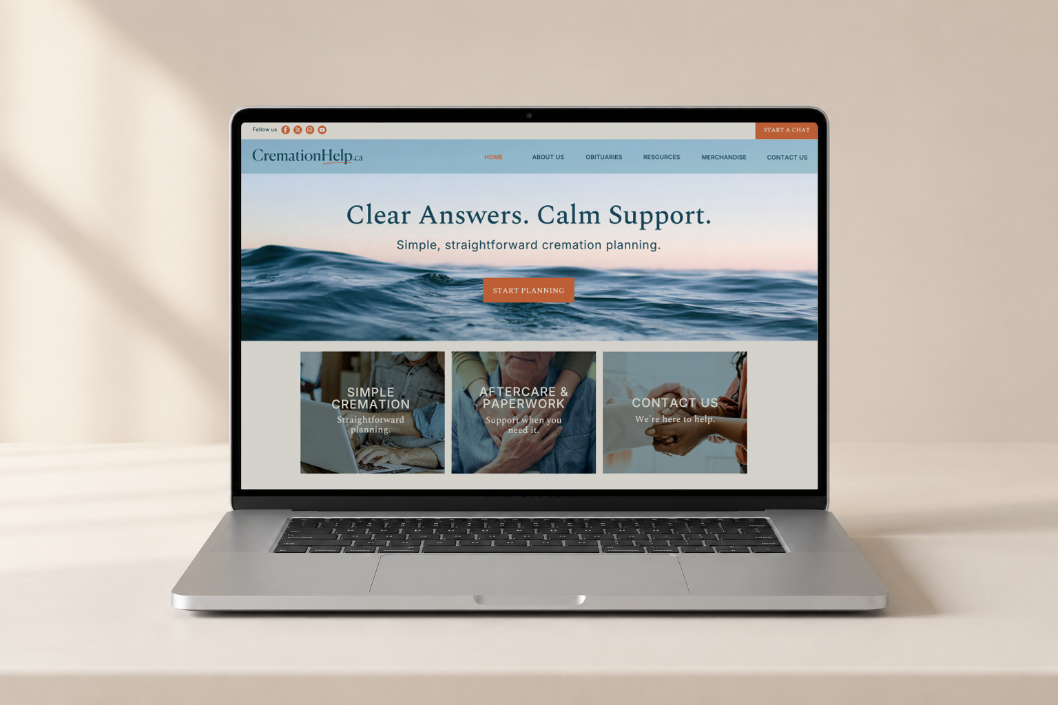 Open laptop displaying a cremation planning website with a calm ocean background and navigation menu.