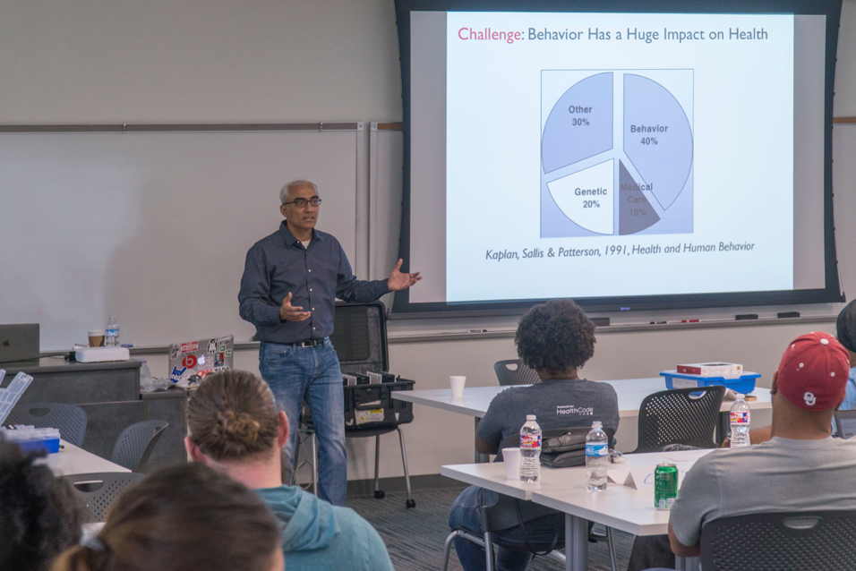 Dr. Ashutosh Sabharwal presenting research on the Potential Uses of Wearable devices to RETs