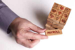 How Outsourcing Your Payroll Can Save You Time (And Headaches)!