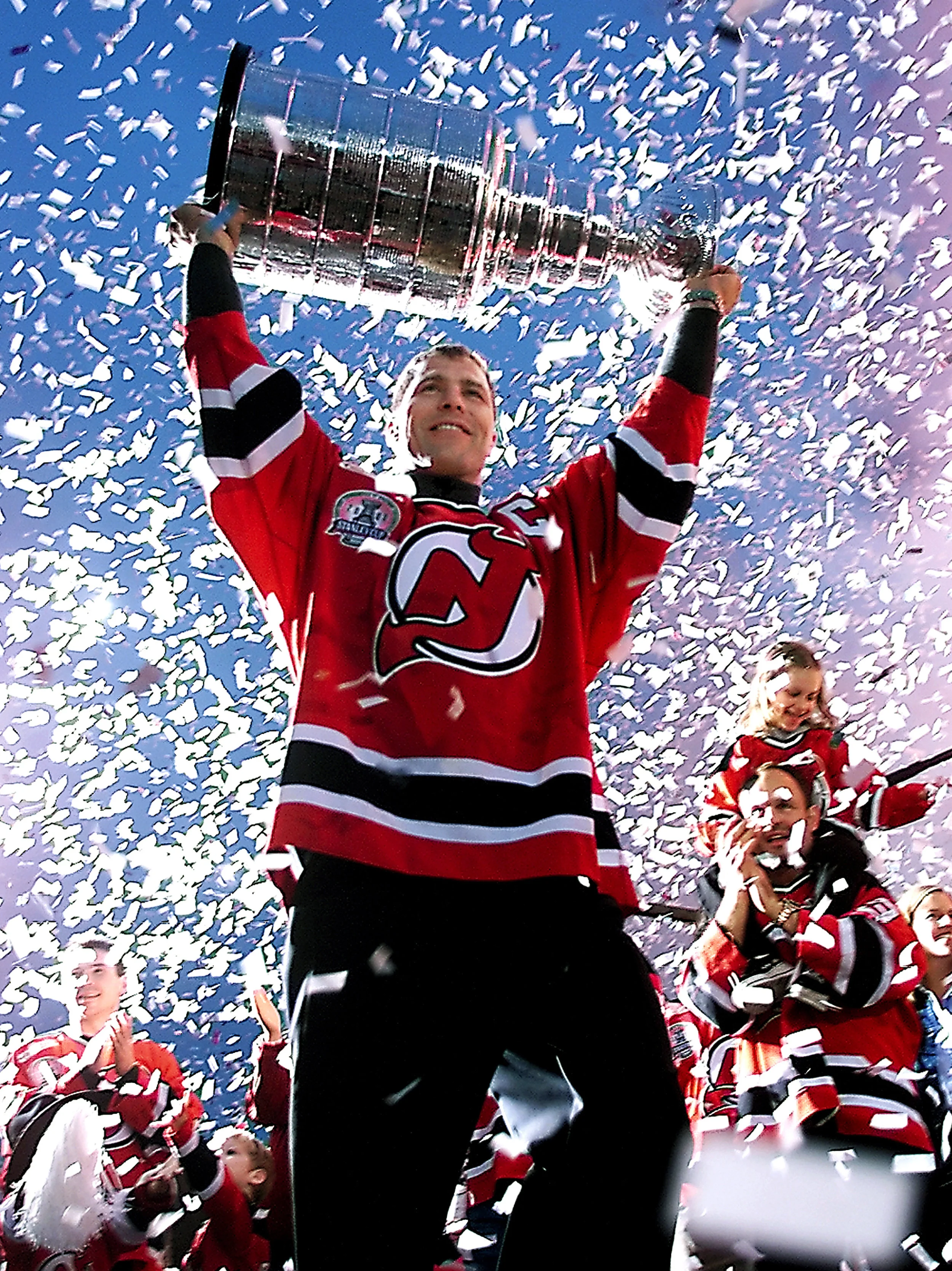 New Jersey Devils Scott Stevens holds up the Stanley Cup for fans at a championship rally at the Continental Arena. East Rutherford, NJ