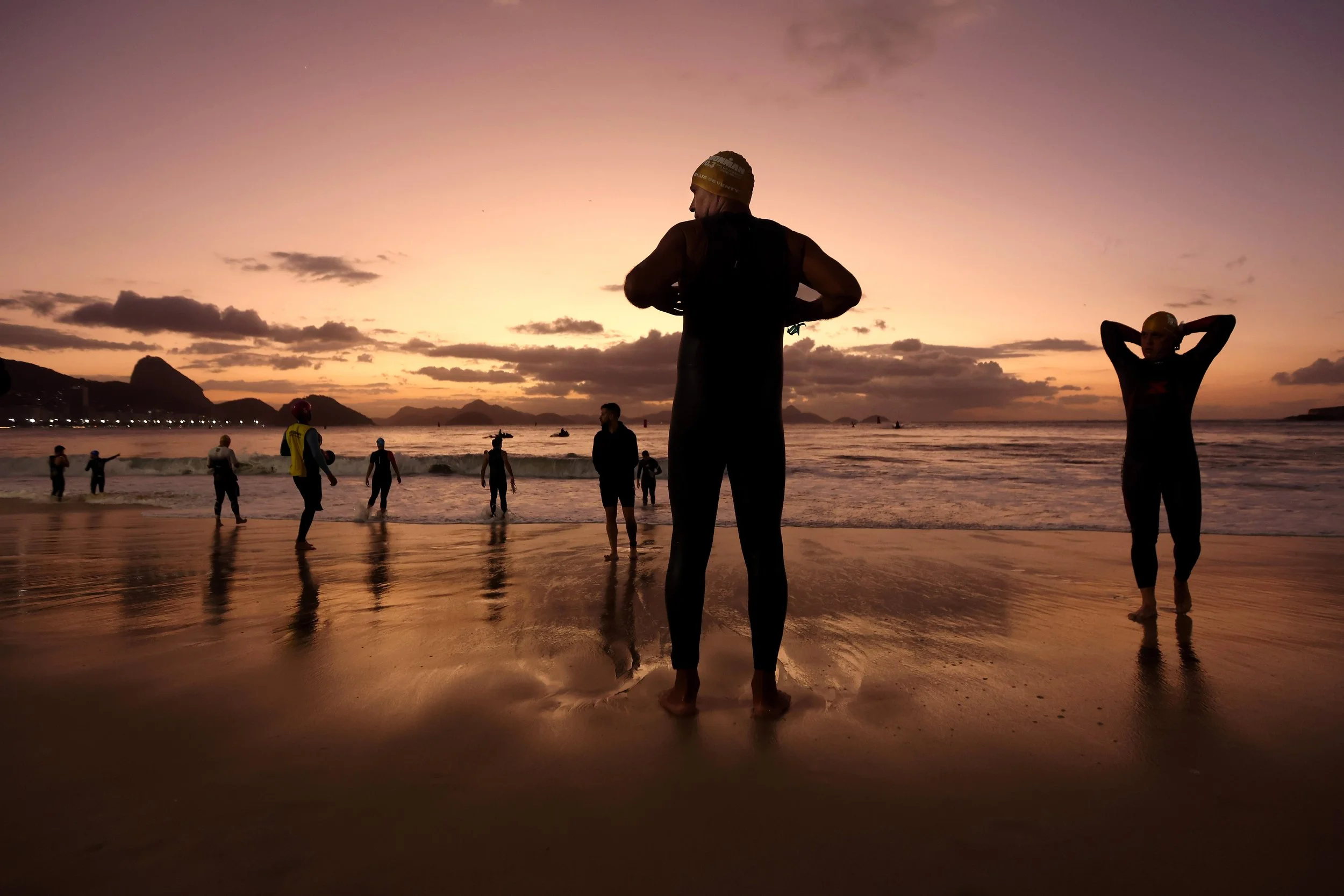At sunrise, athletes get ready to compete in the BBA IRONMAN 70.3 Rio de Janeiro, racing through one of the sport’s most scenic and celebrated courses
