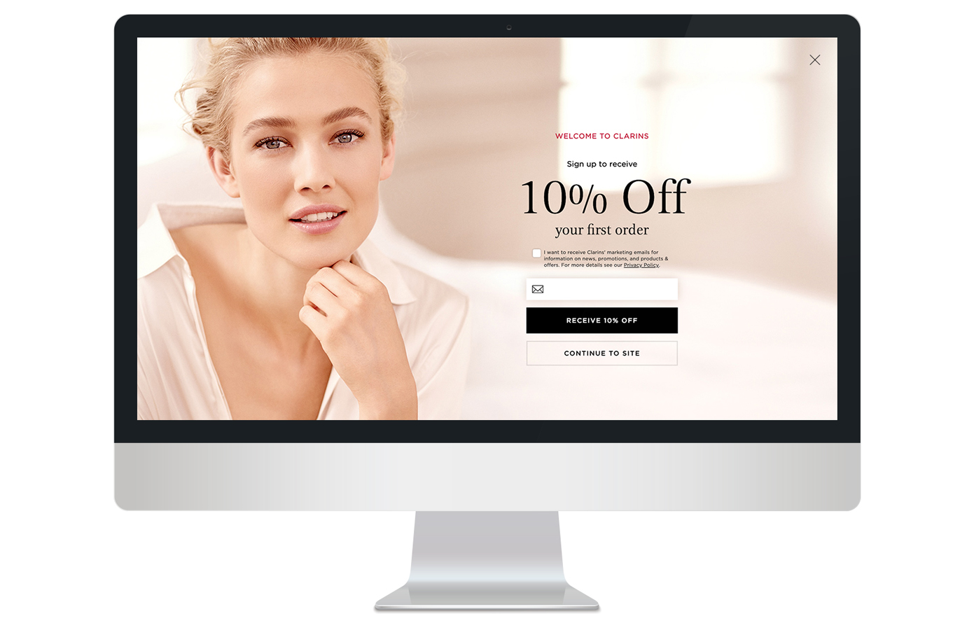Clarins - full screen entrance email capture on desktop