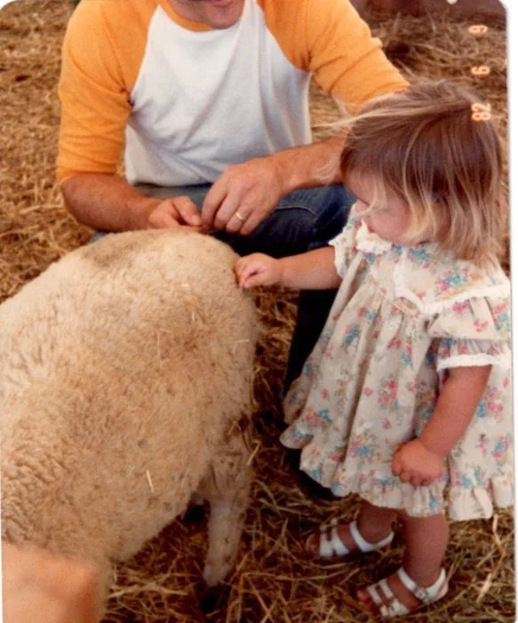 Here I am petting my first sheep.