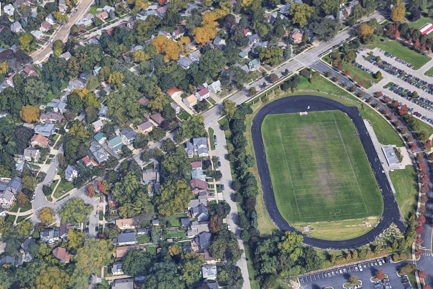 The proposed stadium is closer to neighborhood homes than it is to the school building. Edgewood High School is to the right of the field—out of the frame of this image.