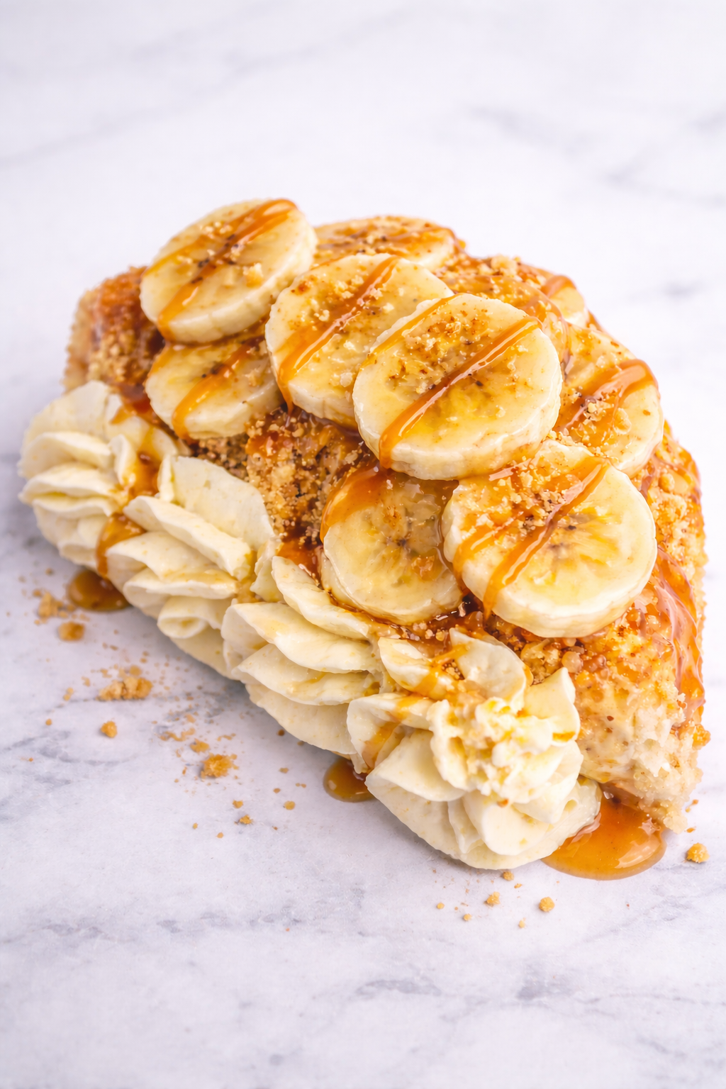 Banana pudding crunch cheesecake slice.png