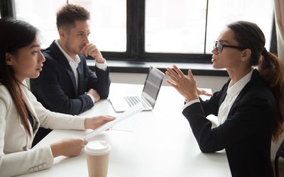 confident-applicant-being-judged-by-interviewing-hr-managers-955158602-5b0473d83037130036d6ab6f.jpg
