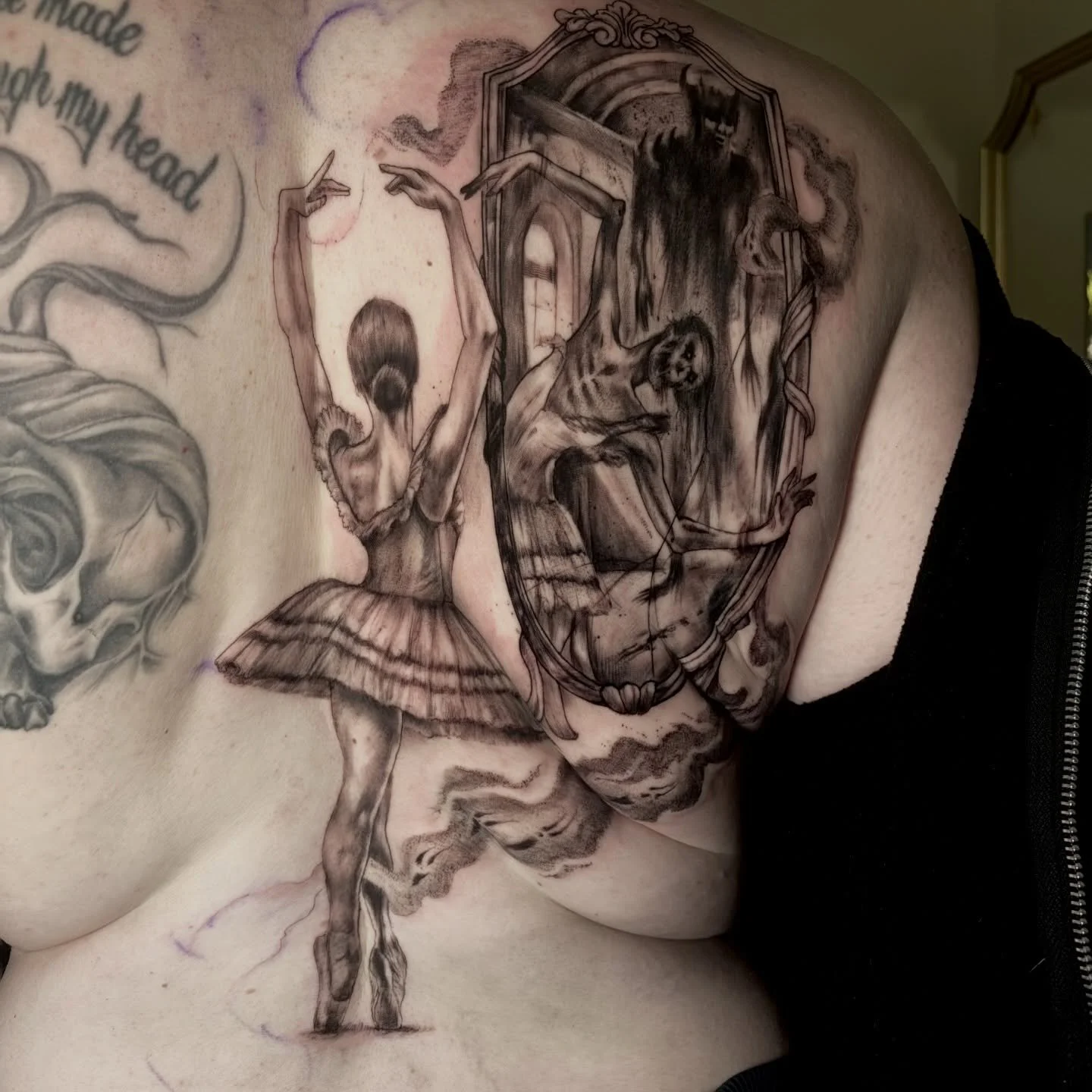 Here&rsquo;s a cool two day back piece we almost finished, but we have more smoke to do. She told me she wanted a ballerina dancing in front of a mirror, but a demon version of her and possibly a ghost reflecting back, and this is what I came up with