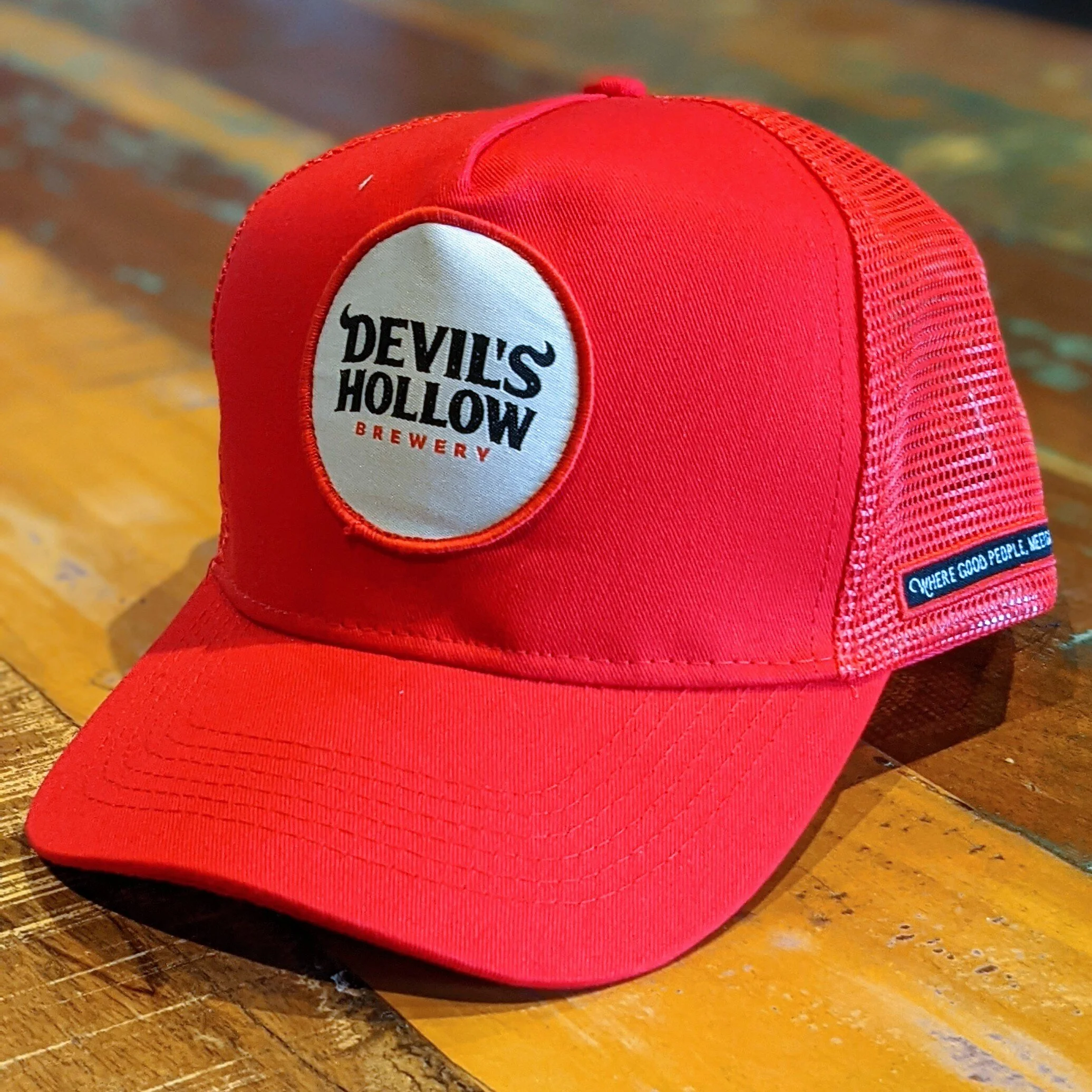 red-trucker-cap-devils-hollow.jpeg