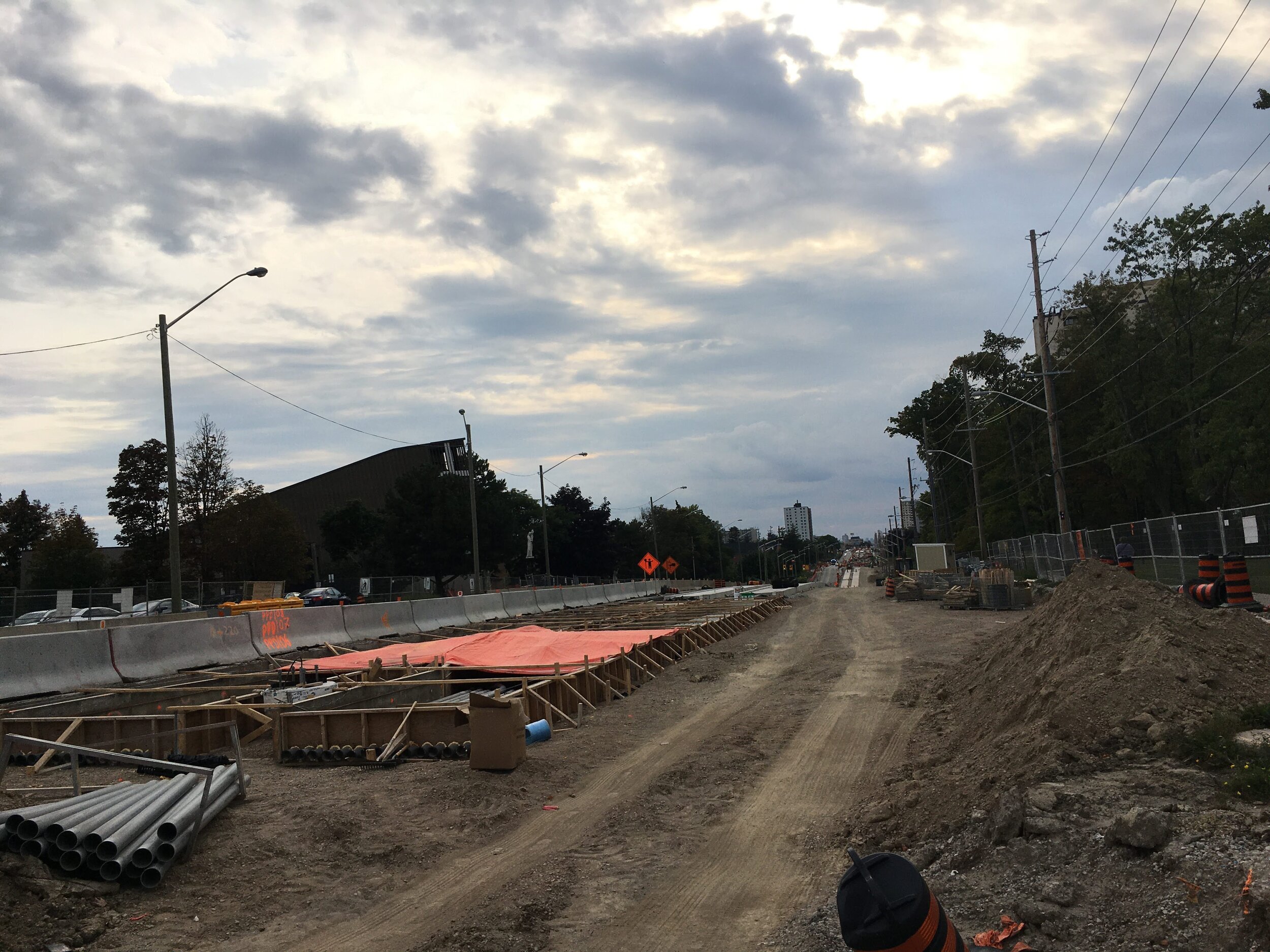 Looking West From Sentinel - Orange tarps protect the just poured concrete from heavy rain.