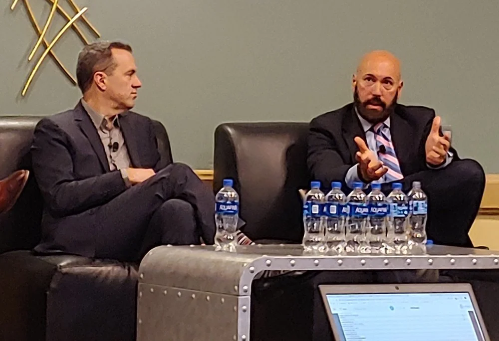 JEFF TUCKER, RIGHT, SPEAKING AT TPM 2019, WITH BRIAN REED OF GEODIS.