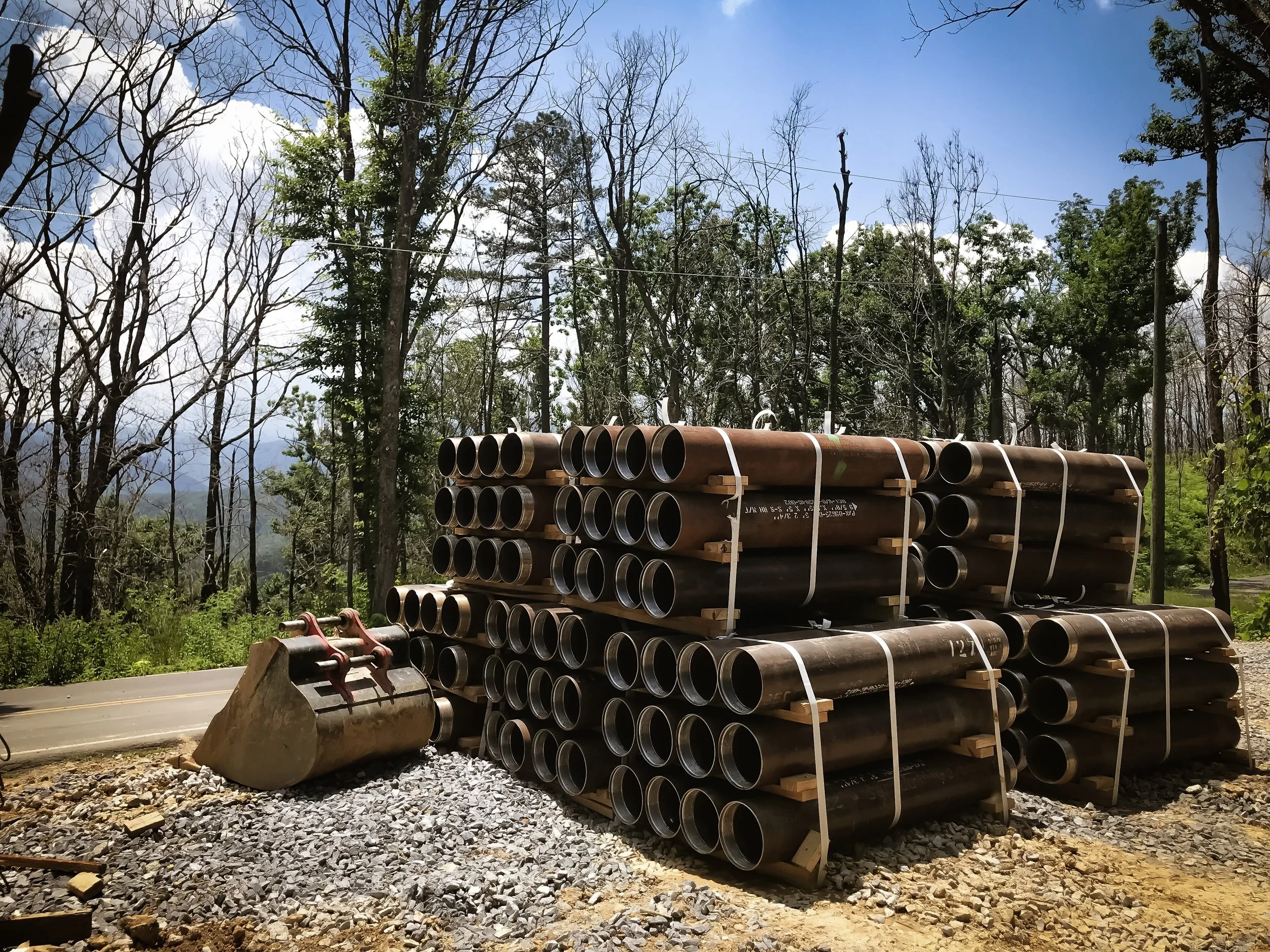 Some steel micropile casings in the lay down area in Gatlinburg, waiting to be put to use.