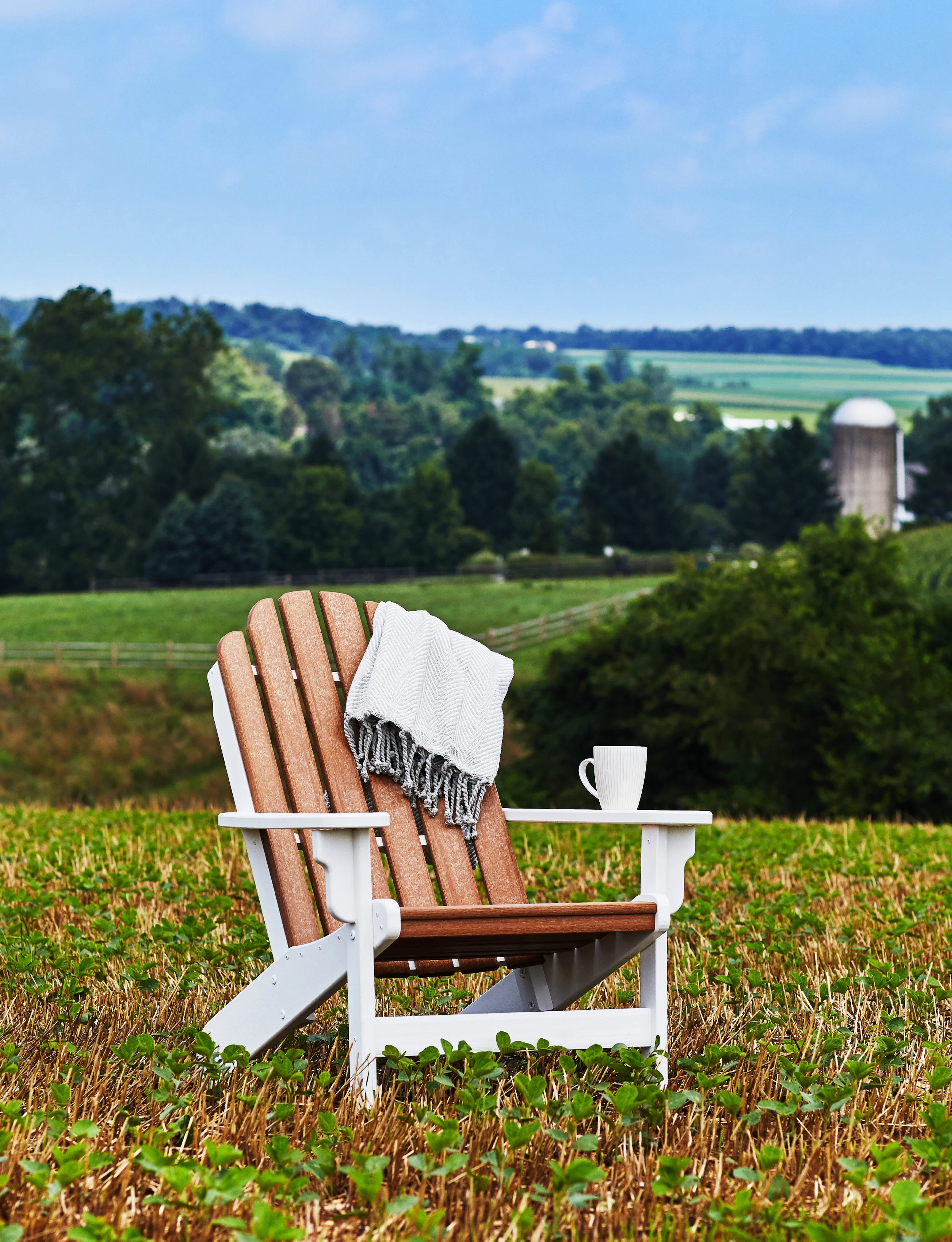 Eco-friendly sustainable Breezesta Shorline Adirondack Chairs made of recycled milk jugs. Durable & maintenance free.