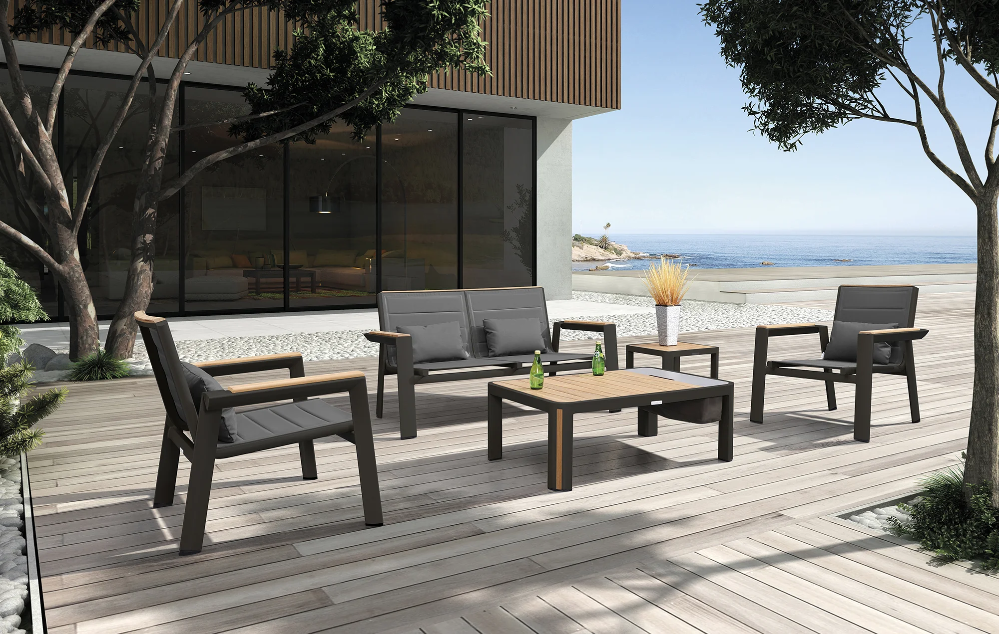 The Geneva Collections combines the contemporary clean lines of crisp powder coated aluminum with fine quality warm teak wood inserts and accents to create beautiful stylish furniture. The furniture is uniquely comfortable resulting from the use of padded textilene in the chairs and loungers. Two Geneva lounge chairs, Geneva loveseat and Geneva coffee table with built in ice bucket.