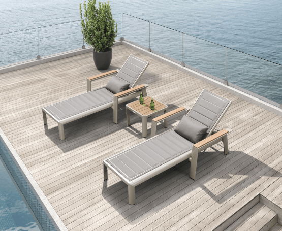 Geneva contemporary sun lounger and teak top side table. Quick drying padded fabric is practical and comfortable. Perfect for lazing away a summer afternoon.